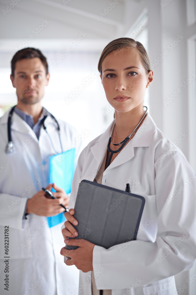 Portrait of serious woman, doctors and team in hospital, healthcare management and clinic services. Expert medical employees, leadership and professional collaboration for trust, support and pride Portrait of serious woman, doctors and team in hospital, healthcare management and clinic services. Expert medical employees, leadership and professional collaboration for trust, support and pride