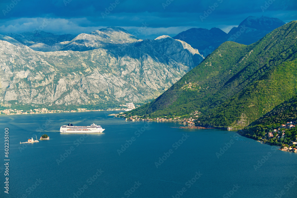 Bird's eye view of the Bay of Kotor, mountains, islands, passenger liner