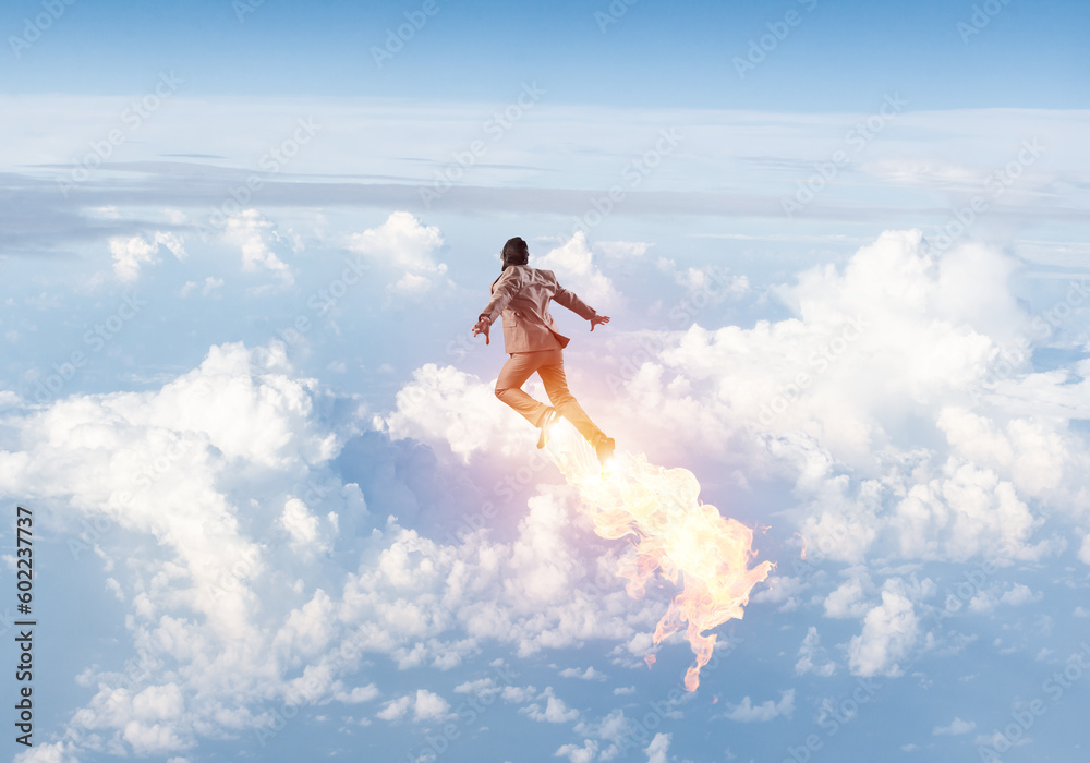 Businessman in suit and aviator hat flying in sky Businessman in suit and aviator hat flying in sky