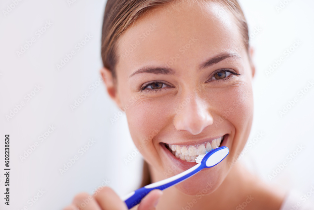 Young woman, portrait and brushing teeth in bathroom with smile, health or self care for hygiene, grooming and routine. Girl, toothbrush and happiness for cleaning, healthy mouth and start morning Young woman, portrait and brushing teeth in bathroom with smile, health or self care for hygiene, grooming and routine. Girl, toothbrush and happiness for cleaning, healthy mouth and start morning