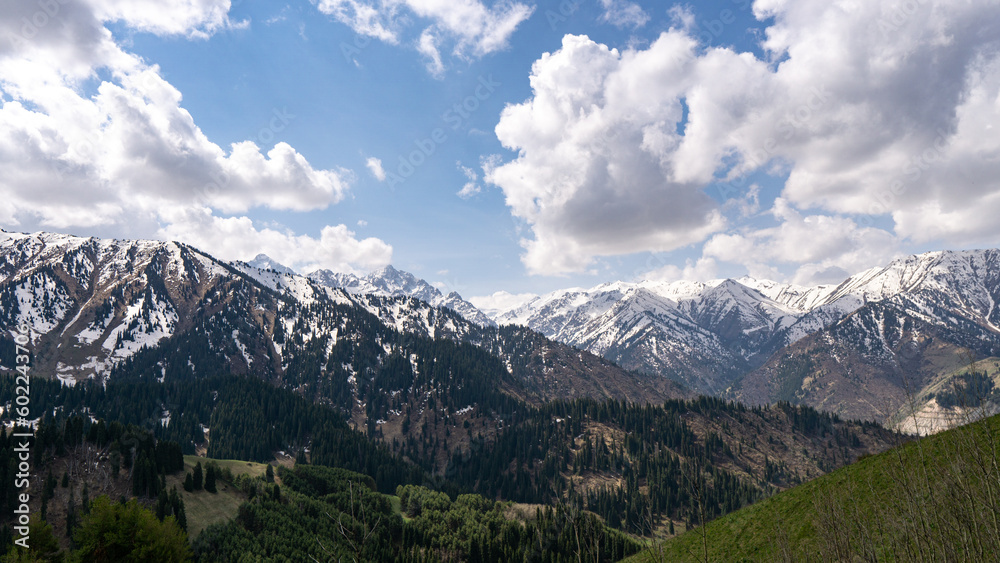 clouds over snowy mountain peaks. cloudy weather in the mountains clouds over snowy mountain peaks. cloudy weather in the mountains