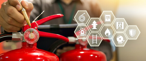 Fire extinguisher has hand engineer checking pressure gauges and prevent icons to prepare fire equipment for protection in emergency case and safety or rescue and alarm system training concept.