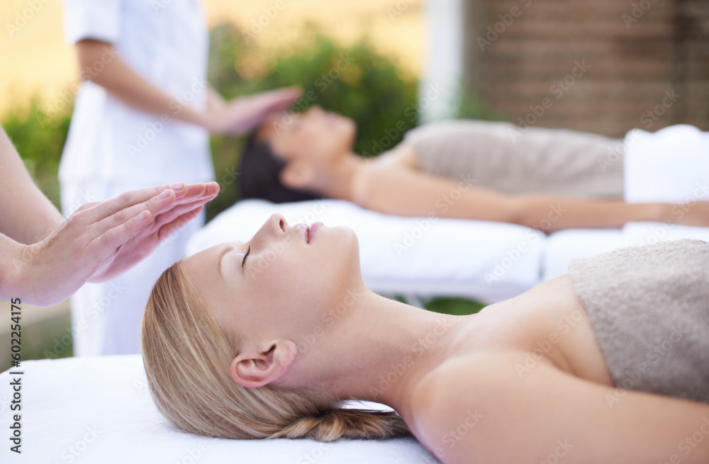 Reiki, facial flow and women at spa for health, wellness and chakra energy healing with luxury stress relief treatment. Beauty salon, skin care and woman in holistic massage on face for calm aura. Reiki, facial flow and women at spa for health, wellness and chakra energy healing with luxury stress relief treatment. Beauty salon, skin care and woman in holistic massage on face for calm aura.