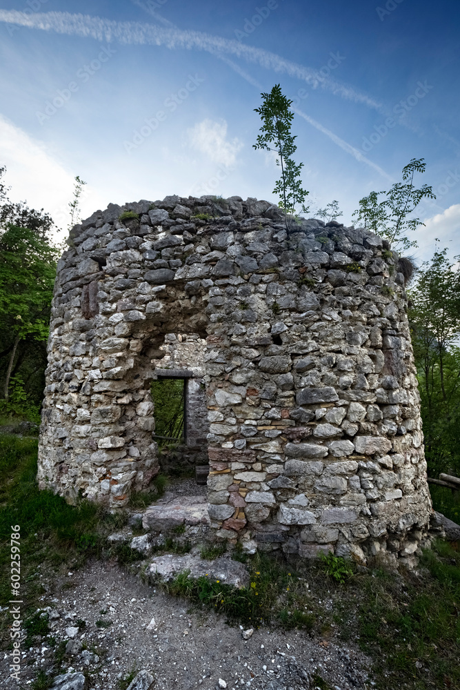 The medieval ruins of the church-tower of San Giovanni alla Pinza. Riva del Garda, Trentino, Italy.
