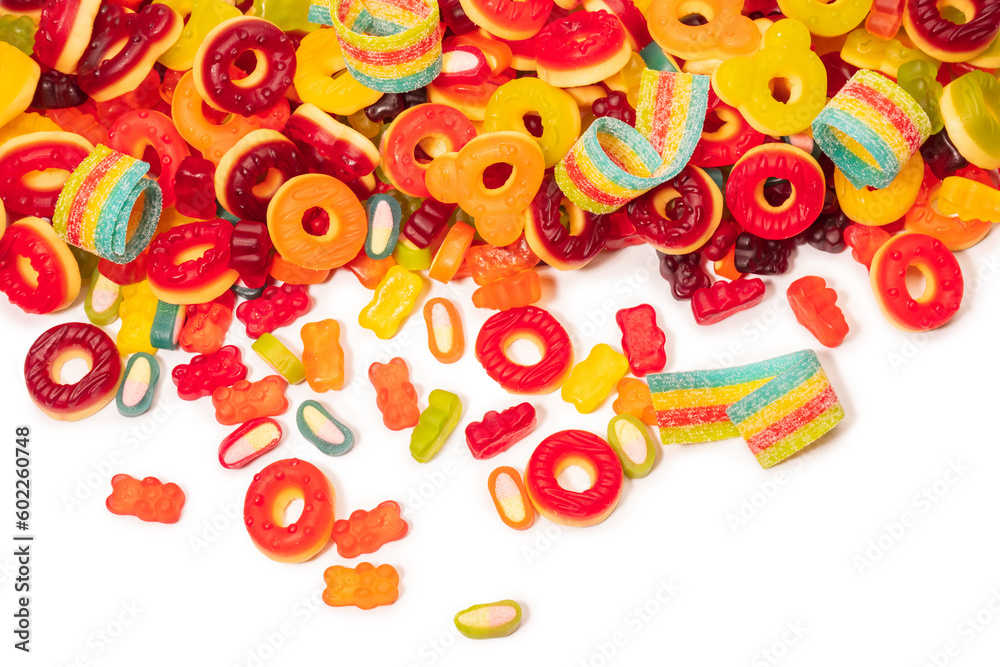 Assorted colorful gummy candies. Top view. Jelly donuts. Jelly bears. Isolated on a white background.