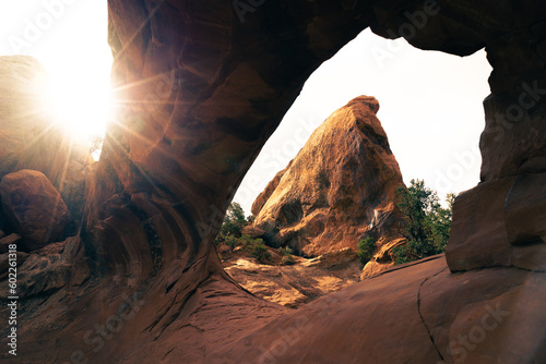 viewh on sandstone rock through sandstone arch in arhes national park 