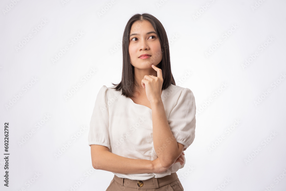 portrait asian young woman questioning and looking away isolated on background portrait asian young woman questioning and looking away isolated on background