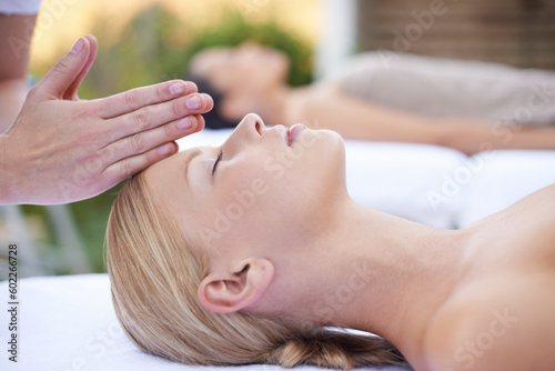 Reiki  massage and face of woman at beauty salon for health  wellness and luxury skincare treatment. Relax at spa  professional skin care and facial acupressure  healing for girl in cosmetic therapy.