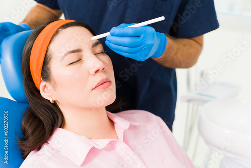Beautiful woman in her 20s getting a cosmetic procedure