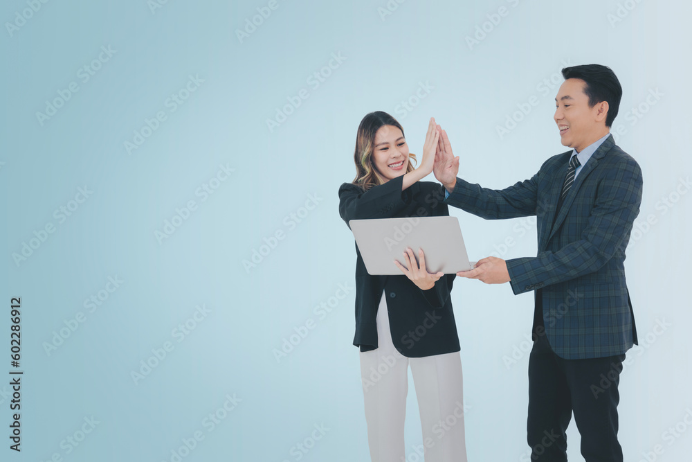 Business people or colleague concept, Businessman and businesswoman using computer laptop or digital tablet working together isolate from background Business people or colleague concept, Businessman and businesswoman using computer laptop or digital tablet working together isolate from background