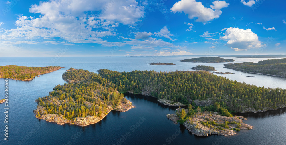Russia. Karelia. Mirror reflection in water. Stones in the water. Ladoga lake. photographed from heights
