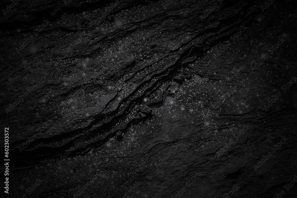 Dark gray black natural stone slab texture background with light grains Dark gray black natural stone slab texture background with light grains