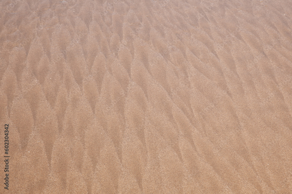 wave pattern background at the beach formerd by wind wave pattern background at the beach formerd by wind