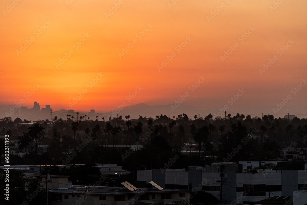 9/7/2022:   A hot summer sun rises over Los Angeles during the end of summer heatwave that caused power disruptions and rolling blackouts