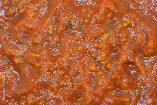 Classic italian bolognese sauce texture background. Preparing lasagna. Making sauce. Italian food. Meat stew.