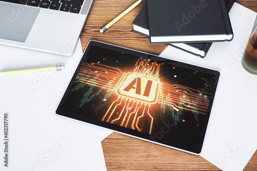 Creative artificial Intelligence symbol concept on modern digital tablet screen. Top view. 3D Rendering