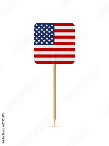 Miniature square paper American flag on wooden stick or toothpick. Decoration for cupcake or other food. 4th of July, Independence or Presidents Day of USA, United States of America