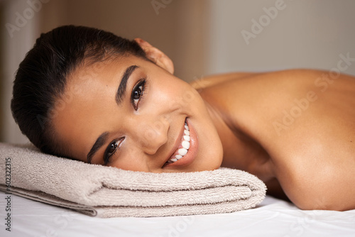 Portrait of girl  smile or massage to relax for zen resting or wellness physical therapy in spa hotel. Face of happy woman in salon to exfoliate for body healing treatment or holistic detox therapy