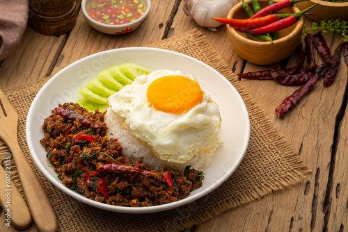 Thai Basil Minced beef,Stir fired ground beef with garlic and basil leaf in chilli sauce with Cooked rice topped with fried egg (Pad Kra pao)