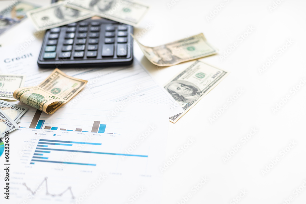 US dollar banknotes on charts graphs paper. Financial development, Banking Account, Statistics, Investment Analytic research data economy. US dollar banknotes on charts graphs paper. Financial development, Banking Account, Statistics, Investment Analytic research data economy.