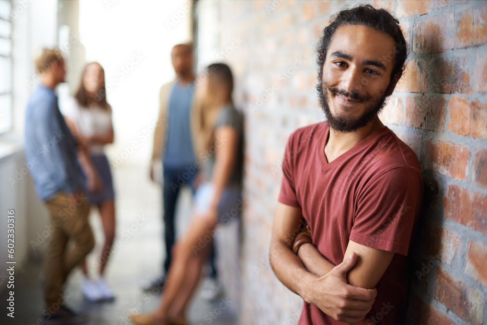 Education, university and happy portrait of man with smile for motivation, knowledge and learning. College, scholarship and face of male student with friends on campus for studying, class and school