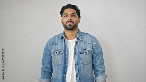 African american man standing with serious expression over isolated white background