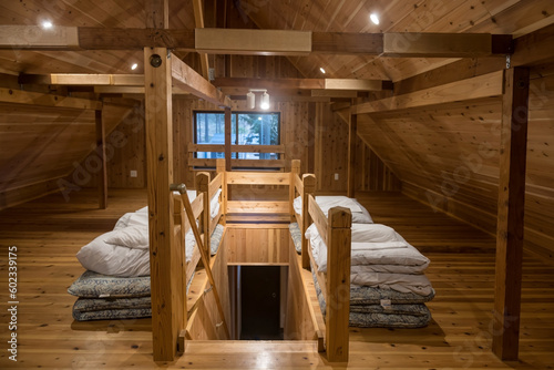 Japanese Futon bed and blanket on house top wooden floor © Blanscape