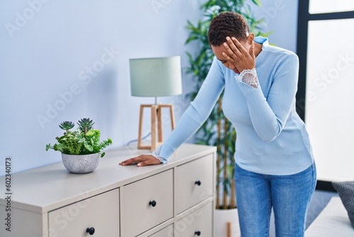 African american woman suffering dizzy standing at home