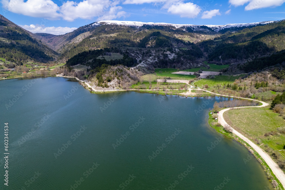 Cubuk Lake in Goynuk District of Bolu, Turkey.  Beautiful lake view with windmills. Shooting with drone.