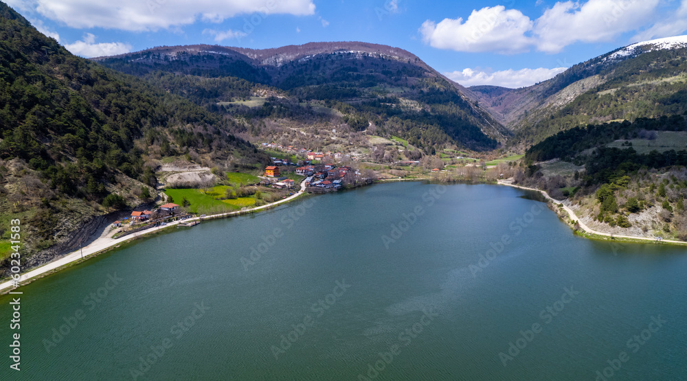 Cubuk Lake in Goynuk District of Bolu, Turkey.  Beautiful lake view with windmills. Shooting with drone.