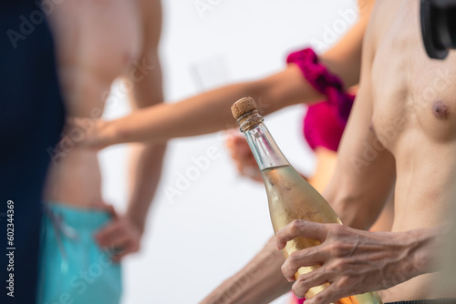 Photography Man and woman friends group enjoy celebration party and fun luxury summer outdoo