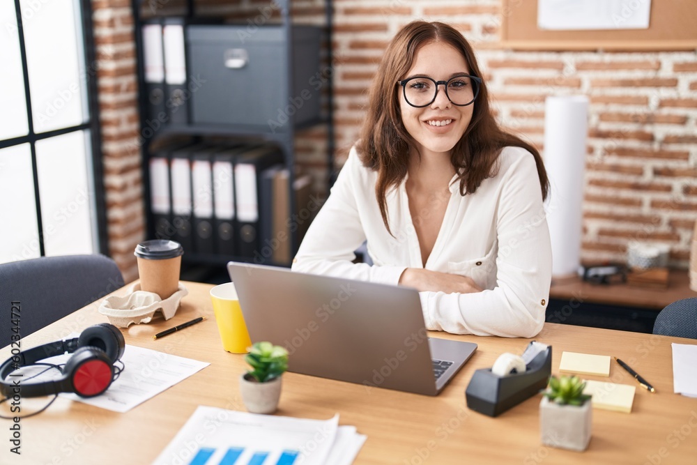 Young woman business worker using laptop working at office Young woman business worker using laptop working at office