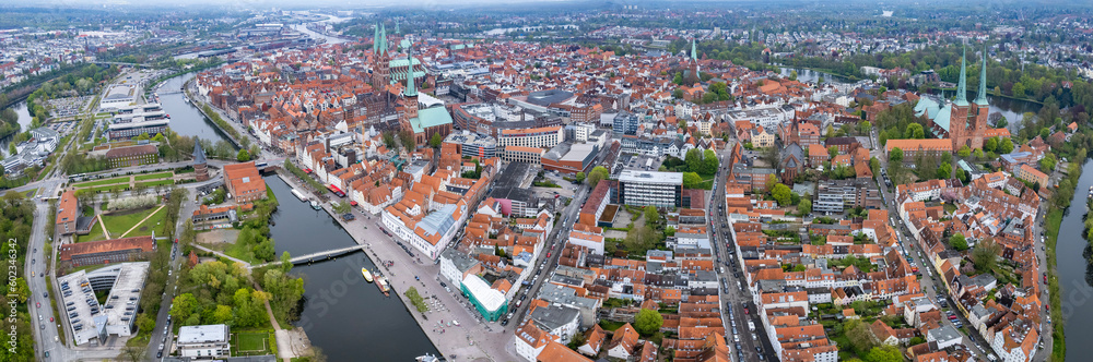 Aerial around the old town of the city Lübeck on a sunny spring day