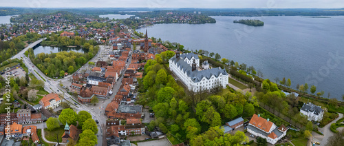 Aerial around the old town of the city Plön on a sunny spring day photo