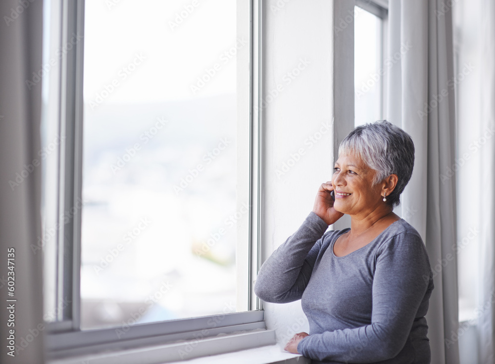 Phone call, window view and senior happy woman speaking, smile and talking to Mexico retirement contact. Listening, happiness and elderly person, lady or female smartphone user consulting on mobile Phone call, window view and senior happy woman speaking, smile and talking to Mexico retirement contact. Listening, happiness and elderly person, lady or female smartphone user consulting on mobile