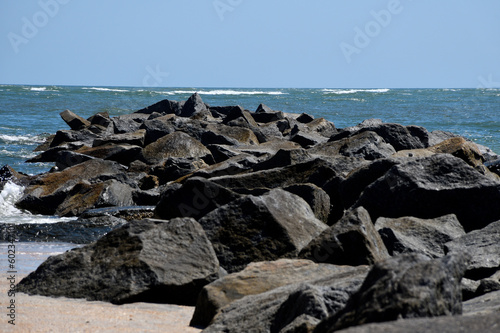 Jetty rocks by the ocean inlet at Vilano Beach, Florida