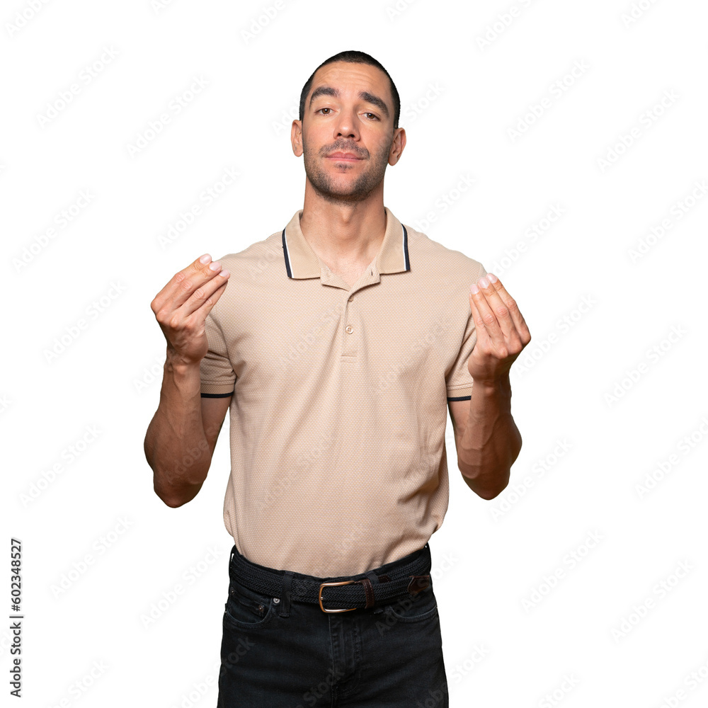 Confused young man making an italian gesture of not understanding Confused young man making an italian gesture of not understanding
