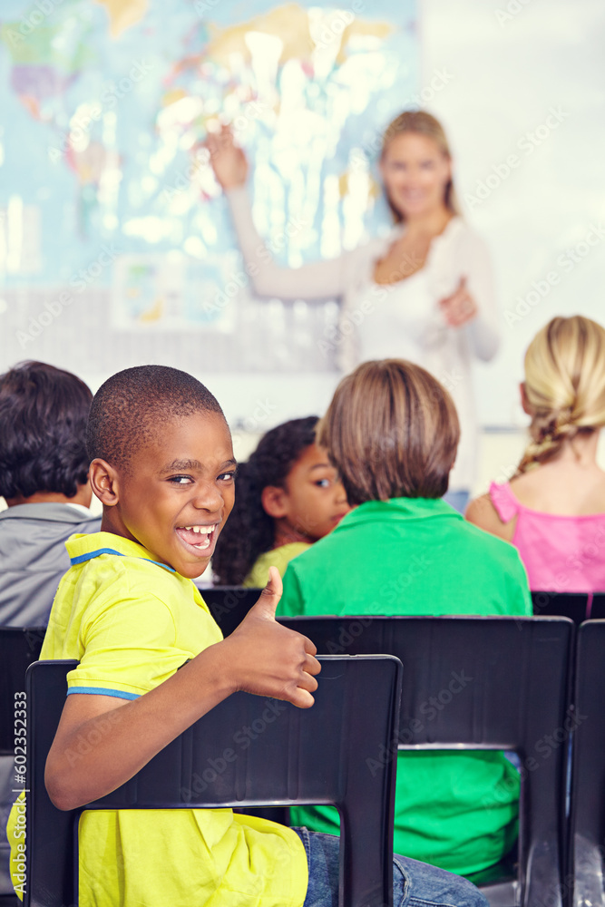 Portrait, black child and thumbs up of student in class, elementary school or classroom. Funny, education and kid with hand gesture for like emoji, agreement or learning, success and approval sign.