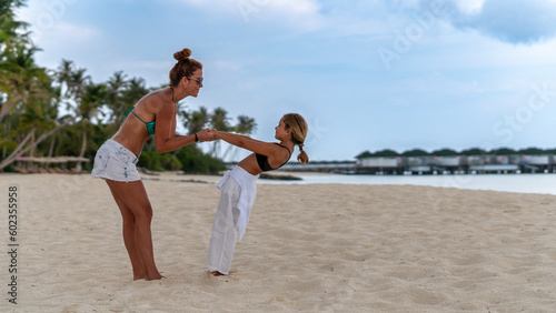 Mother and Daughter Bonding with Beach Games