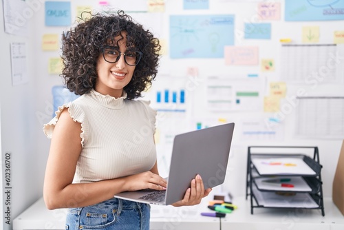 Young middle eastern woman business worker using laptop working at office