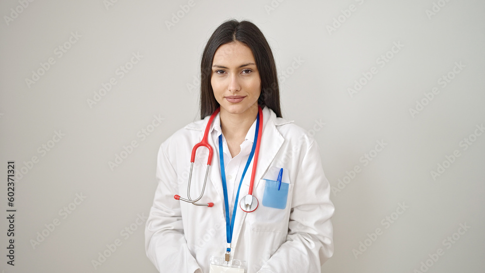 Young beautiful hispanic woman doctor smiling confident standing over isolated white background