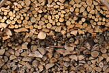 Screen-filling close-up of a woodpile
