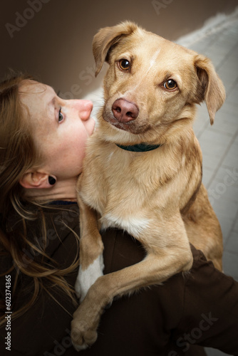 Obraz na płótnie Portrait of beautiful blonde girl with a dog w salonie