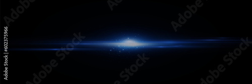 Glow effect. Blue glowing particles  stars. Shiny particles explode. On a black background.