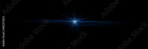 A flash of blue light on a black background. Flash of light and rays.