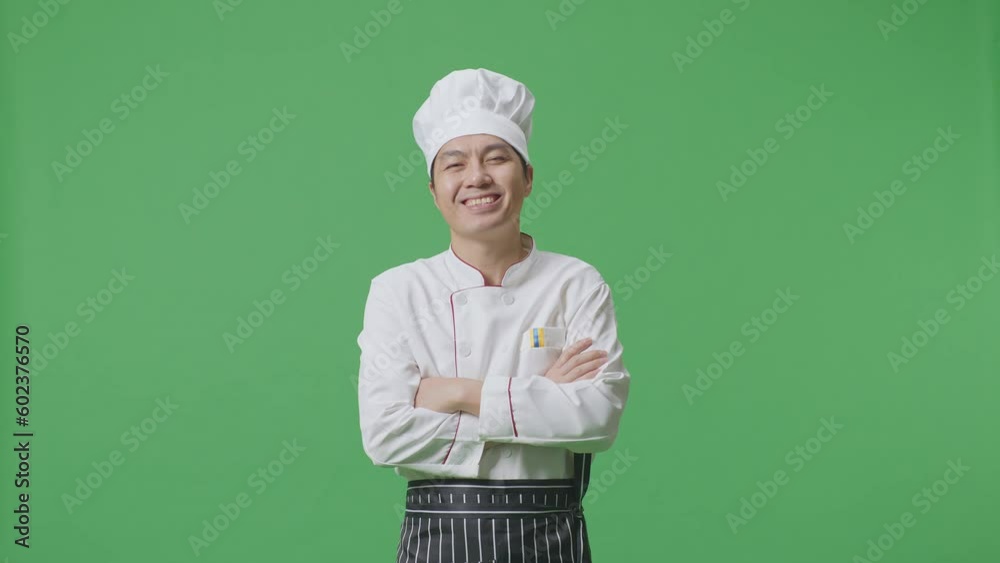 Asian Man Chef Smiling And Crossing His Arms To Camera While Standing In The Green Screen Background Studio
Asian Man Chef Smiling And Crossing His Arms To Camera While Standing In The Green Screen Background Studio