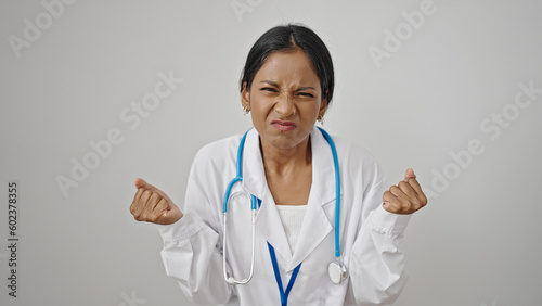 African american woman doctor angry and stressed over isolated white background
