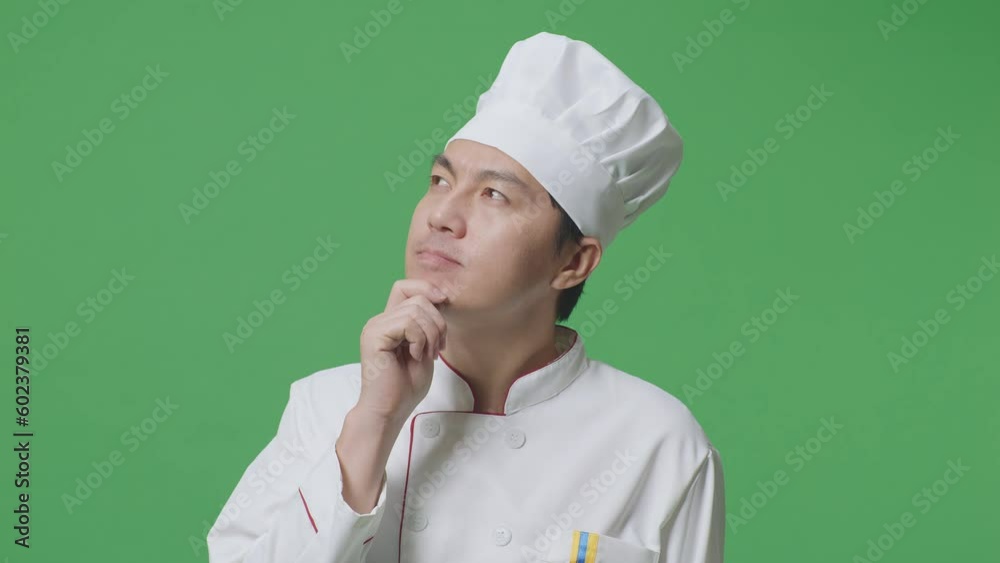 Close Up Of Asian Man Chef Thinking About Something And Looking Around While Standing In The Green Screen Background Studio
Close Up Of Asian Man Chef Thinking About Something And Looking Around While Standing In The Green Screen Background Studio