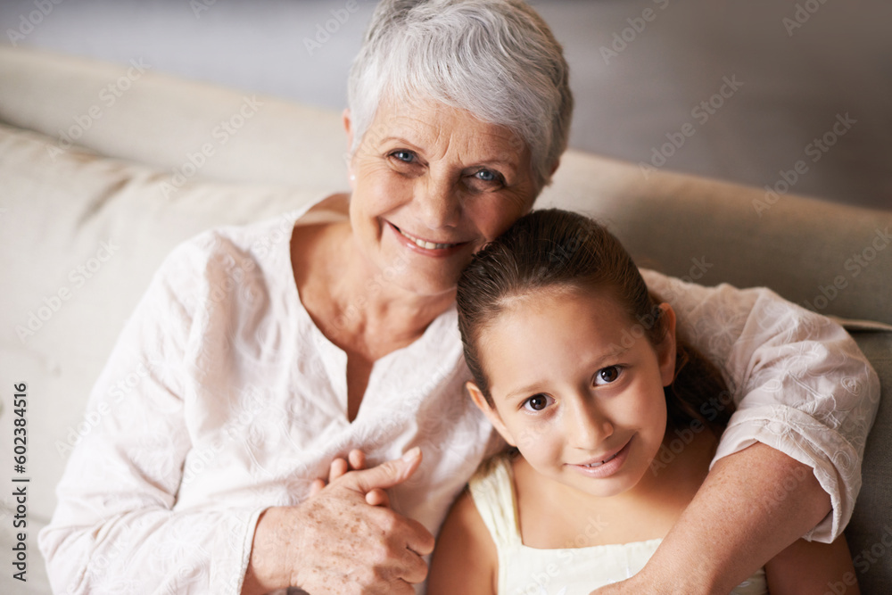 Portrait, smile or grandma hugging a happy girl with love in family home on holiday break together. Child, embrace or elderly grandmother relaxing or bonding to enjoy quality time in retirement Portrait, smile or grandma hugging a happy girl with love in family home on holiday break together. Child, embrace or elderly grandmother relaxing or bonding to enjoy quality time in retirement