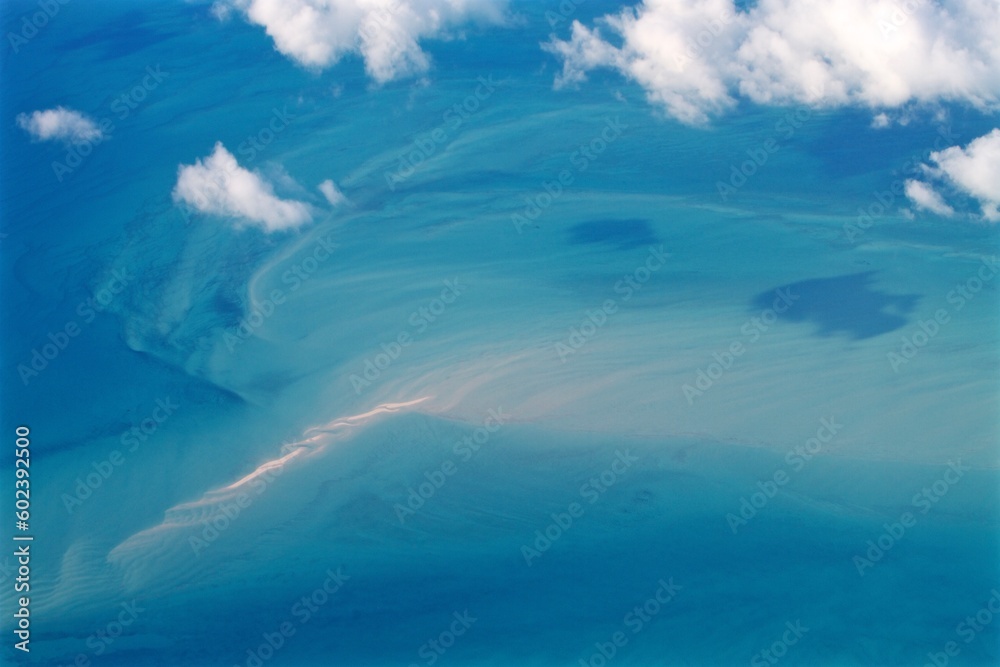 Fototapeta premium Sand Atoll and turquoise sea water seen from the sky, Bahamas
